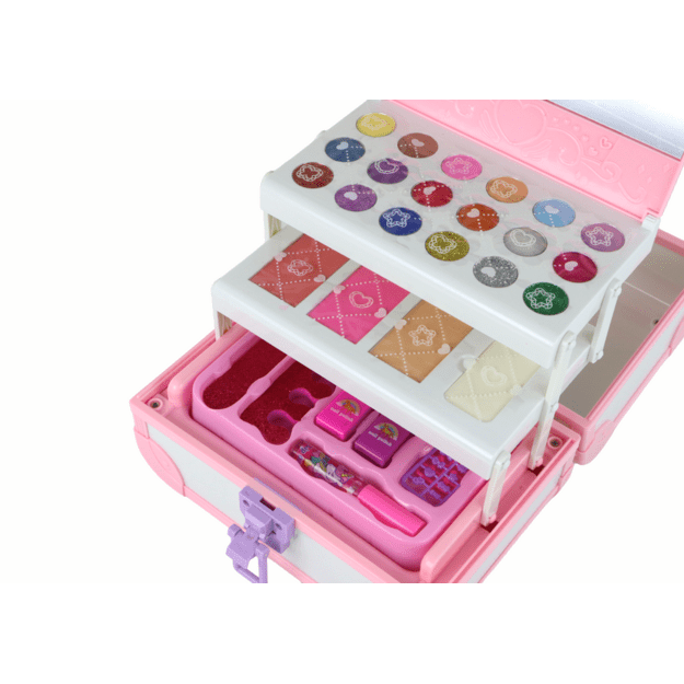 Set of beauty cosmetics for make-up doing nails in a pink case 1