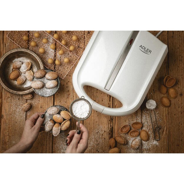 Peanut-shaped electric pan for baking cookies