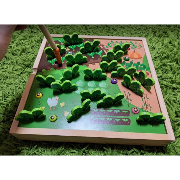 Montessori stalo žaidimas - kirmėliukai ir daržovės sode