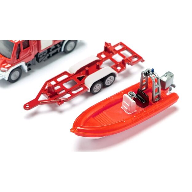 Metal fire truck with trailer and boat SIKU 1636